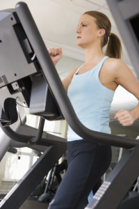 Woman Walking on Treadmill